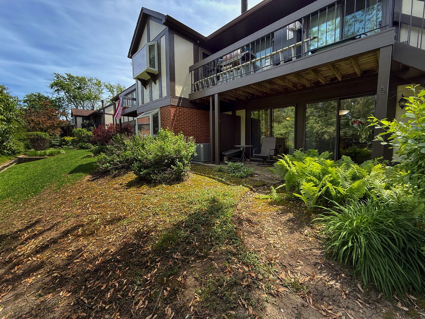 258 Brookside Lane, Unit B Willowbrook, IL 60527 - Photo 20 of 21 front view of a house with a yard