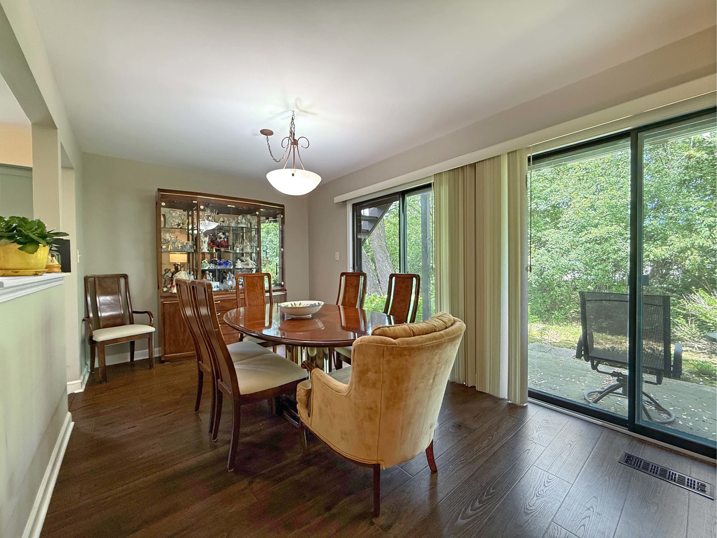 258 Brookside Lane, Unit B Willowbrook, IL 60527 - Photo 5 of 21 a view of a dining room with furniture window and wooden floor