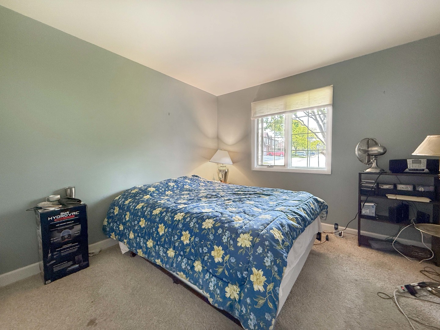 258 Brookside Lane, Unit B Willowbrook, IL 60527 - Photo 10 of 21 a bedroom with a bed and a furniture