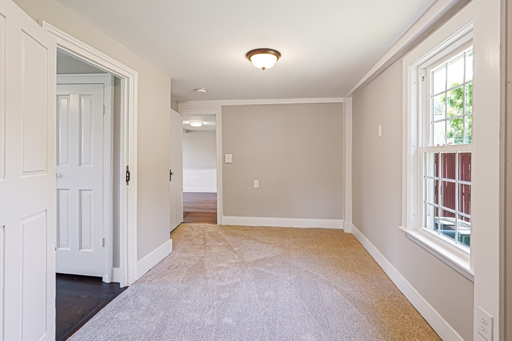 11 Millville Road Mendon, MA 01756 - Photo 13 of 28 a view of an empty room with a window