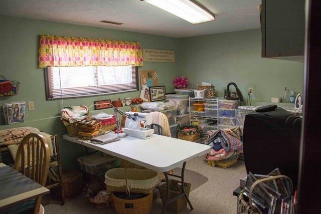1808 Kelly Road Rock Falls, IL 61071 - Photo 7 of 12 a view of a workspace with furniture and a window
