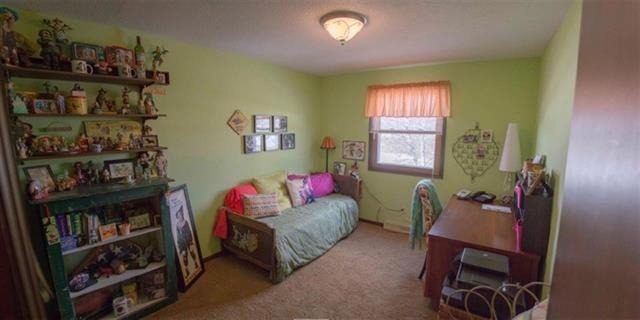 1808 Kelly Road Rock Falls, IL 61071 - Photo 10 of 12 a living room with furniture cabinets and window