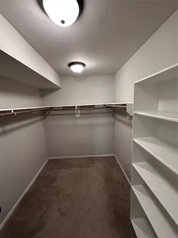 a view of a room with racks on the wall