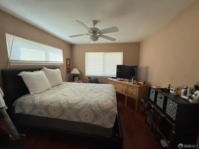 a bedroom with a bed and furniture