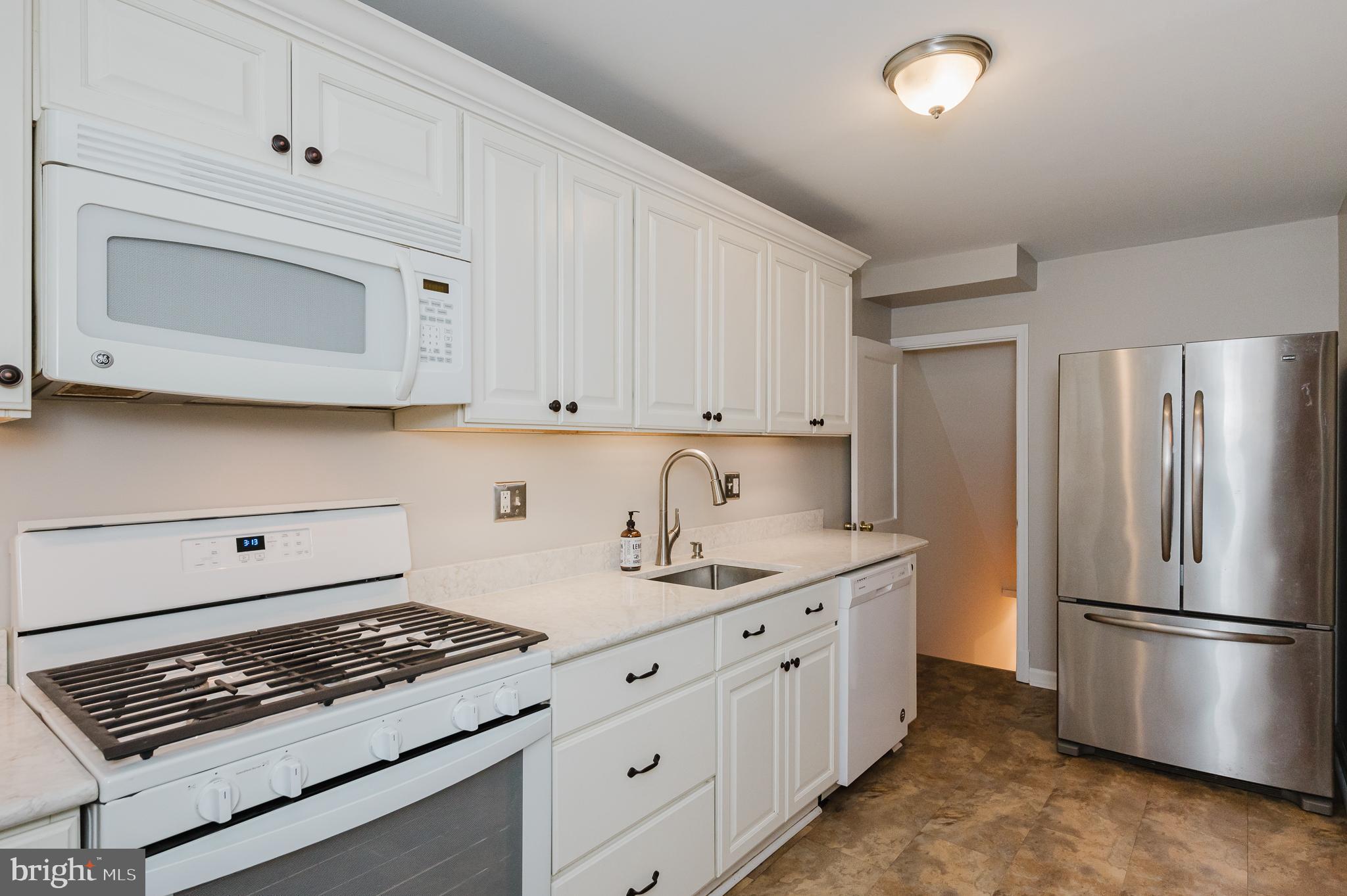 1634 Aberdeen Road Towson, MD 21286 - Photo 16 of 32 UPDATED KITCHEN WITH QUARTZ COUNTERS