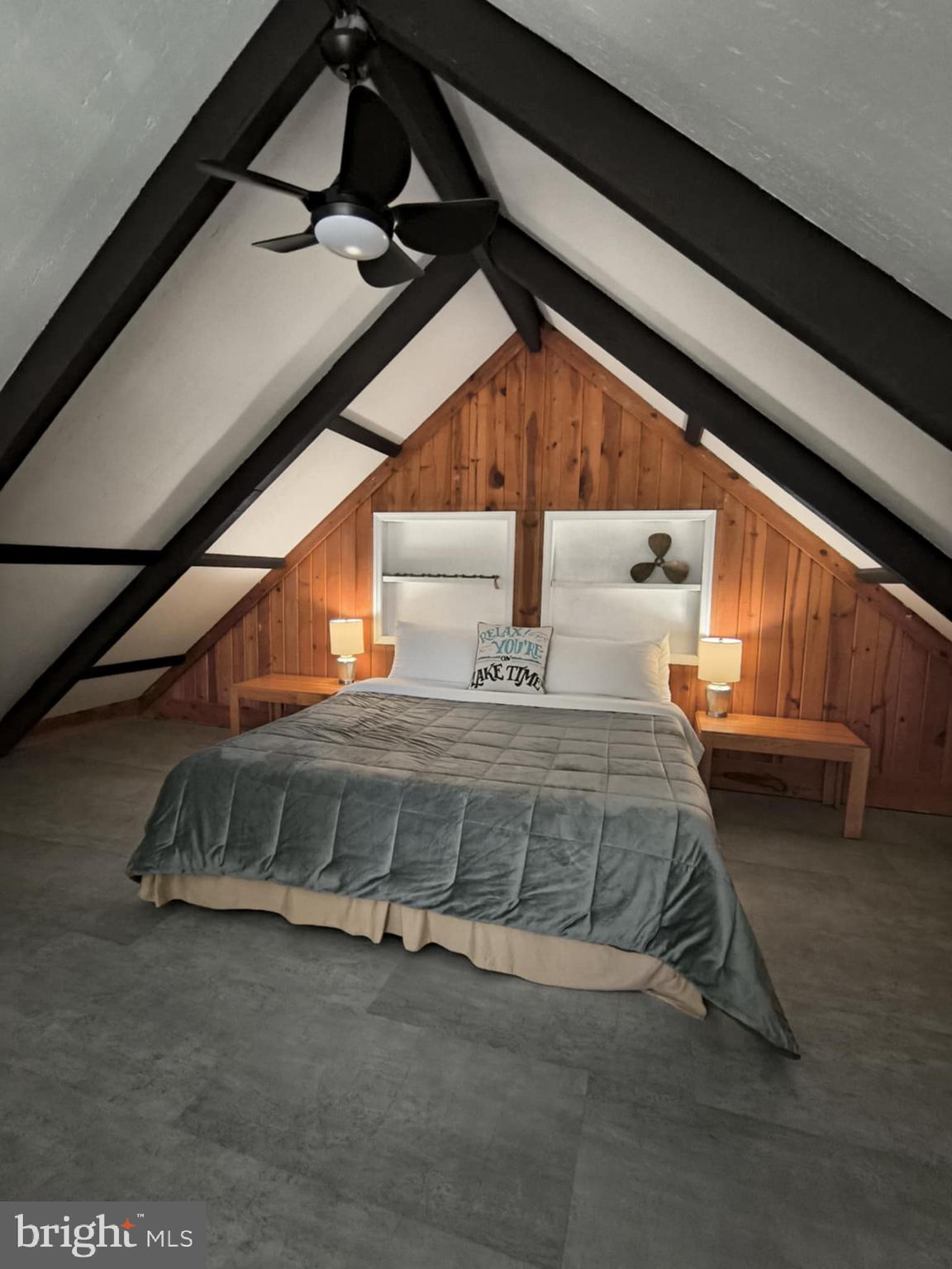 202 Constitution Boulevard Locust Grove, VA 22508 - Photo 12 of 36 a bedroom with a bed and a window