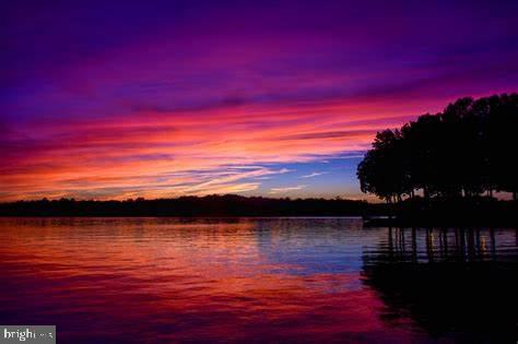 202 Constitution Boulevard Locust Grove, VA 22508 - Photo 35 of 36 a view of ocean with sunset