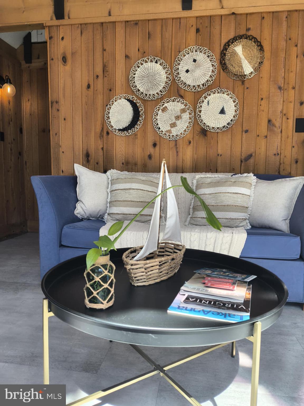 202 Constitution Boulevard Locust Grove, VA 22508 - Photo 8 of 36 a living room with furniture and rug