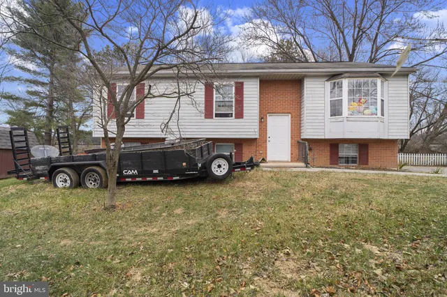 a car parked in front of a house