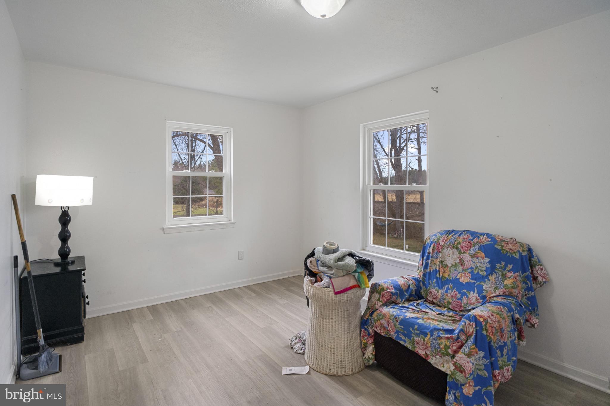 1909 Hanover Pike Hampstead, MD 21074 - Photo 11 of 32 a bedroom with furniture and a window