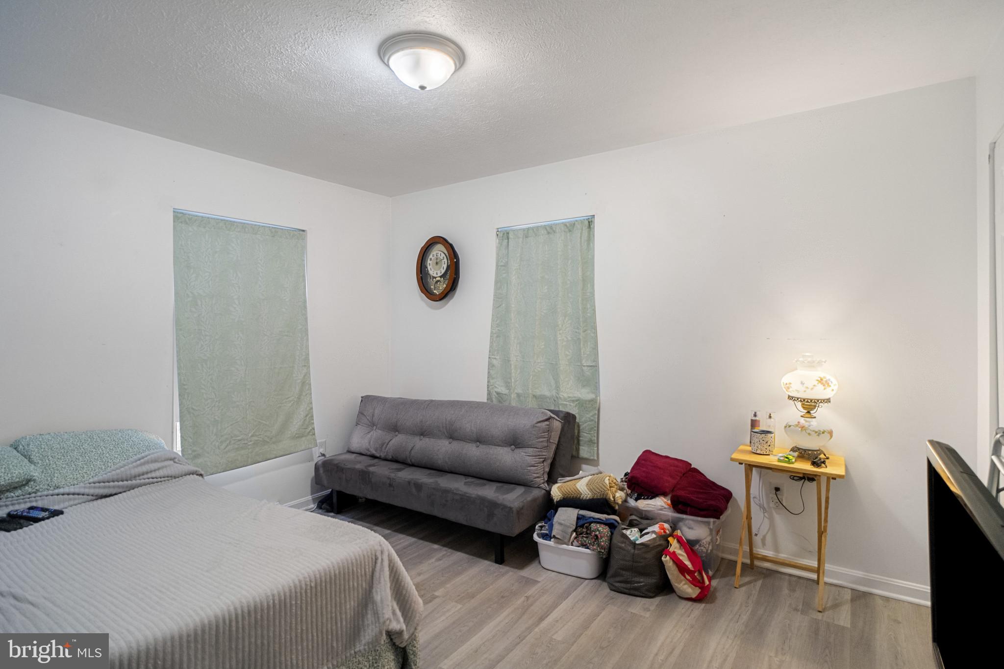 1909 Hanover Pike Hampstead, MD 21074 - Photo 13 of 32 a living room with furniture and a wooden floor