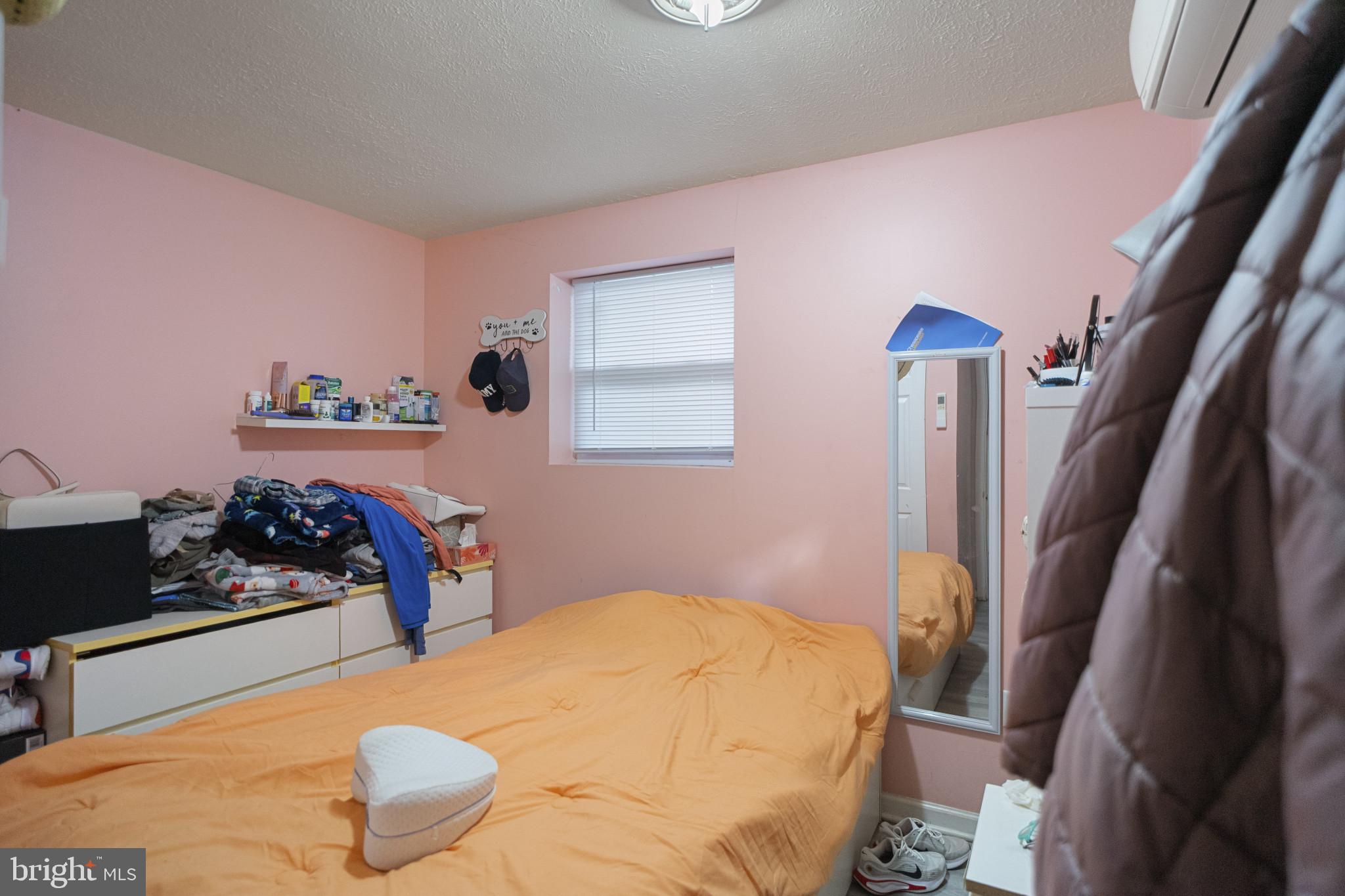 1909 Hanover Pike Hampstead, MD 21074 - Photo 23 of 32 a bedroom with a bed and dresser