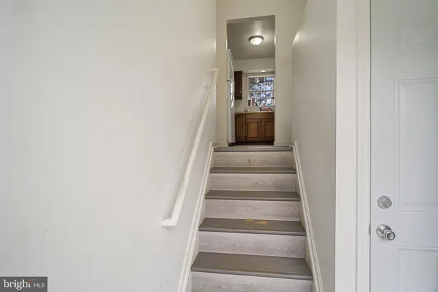 a view of entryway with wooden floor