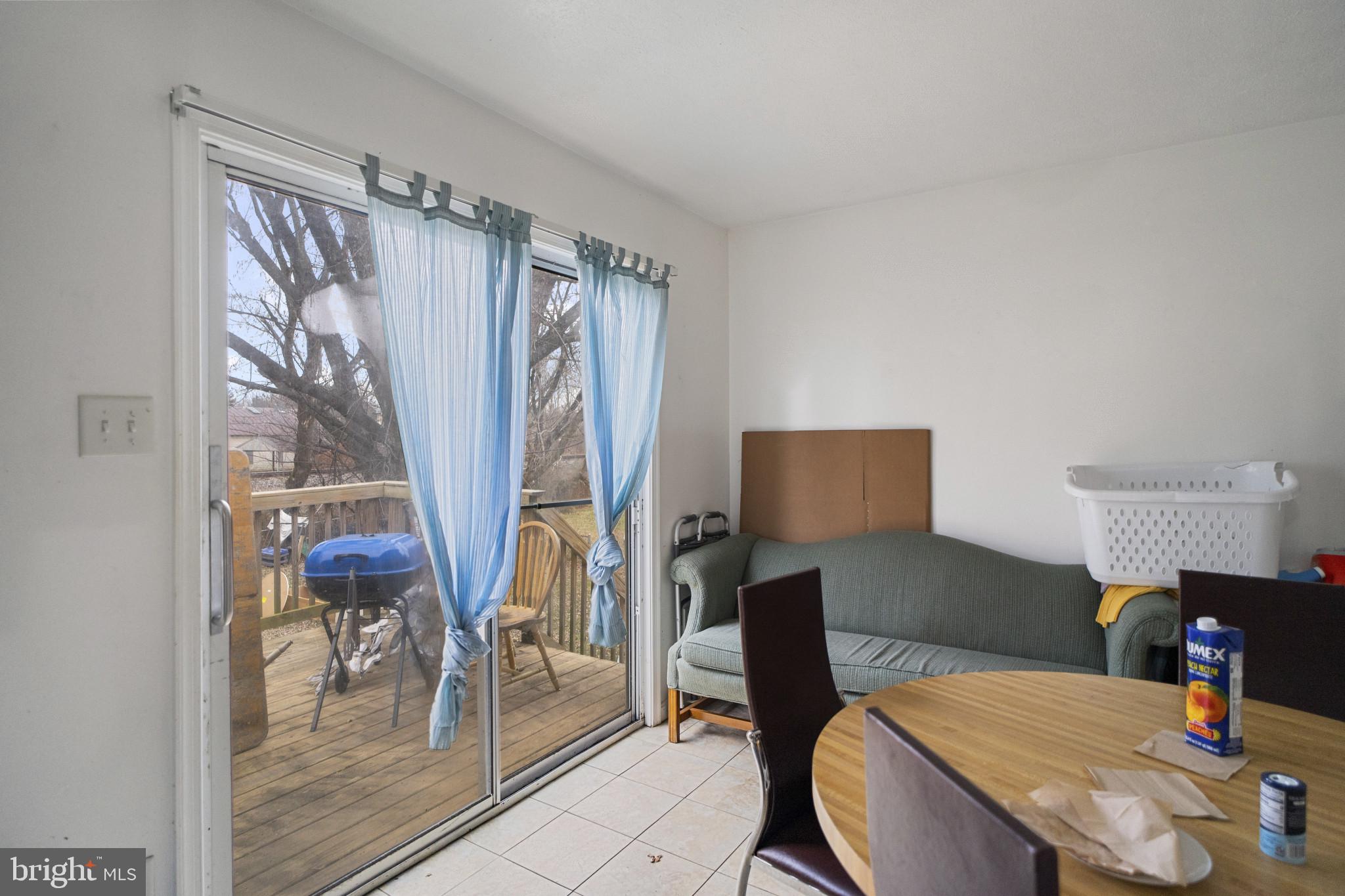 1909 Hanover Pike Hampstead, MD 21074 - Photo 6 of 32 a reading room with furniture a rug and a window