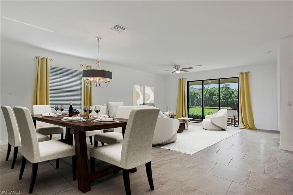 18293 Ridgeline Drive Estero, FL 33928 - Photo 10 of 47 a living room with furniture two window and a table