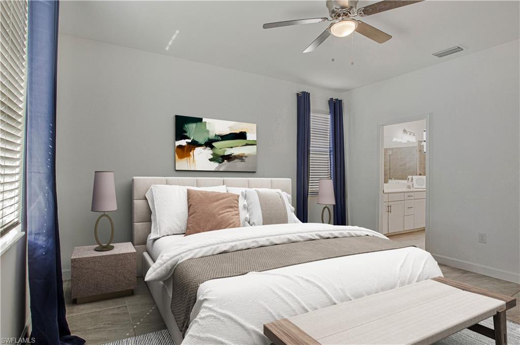 18293 Ridgeline Drive Estero, FL 33928 - Photo 22 of 47 a bedroom with a bed a ceiling fan and a dresser