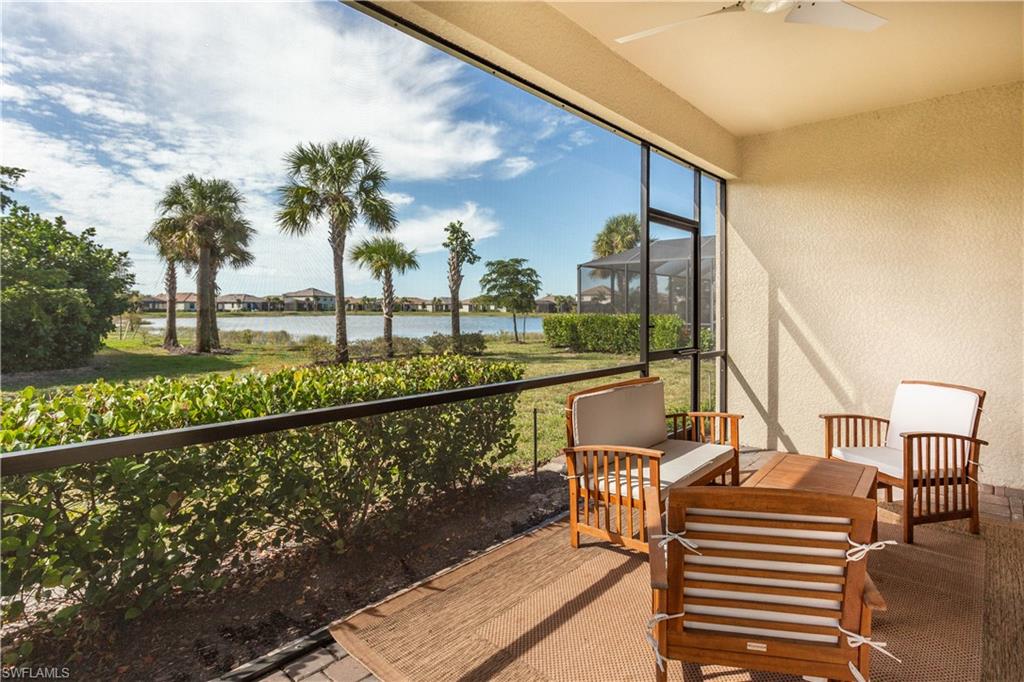 18293 Ridgeline Drive Estero, FL 33928 - Photo 26 of 47 a view of a balcony with chairs and wooden fence