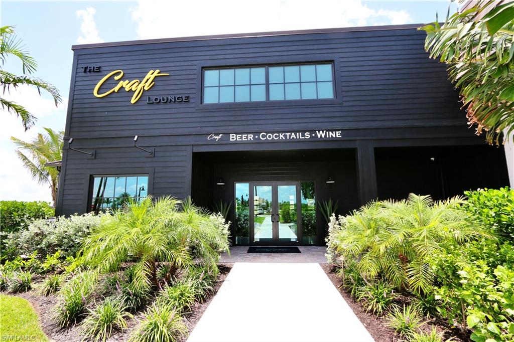 18293 Ridgeline Drive Estero, FL 33928 - Photo 35 of 47 a front view of a house