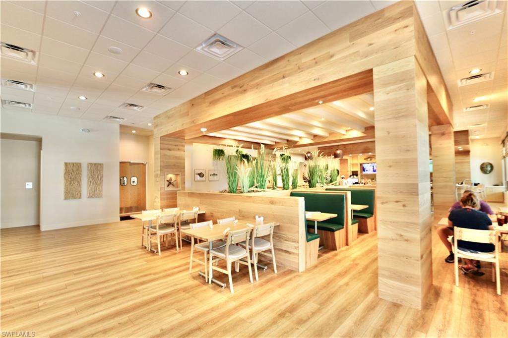 18293 Ridgeline Drive Estero, FL 33928 - Photo 43 of 47 a living room with lots of furniture and a large window