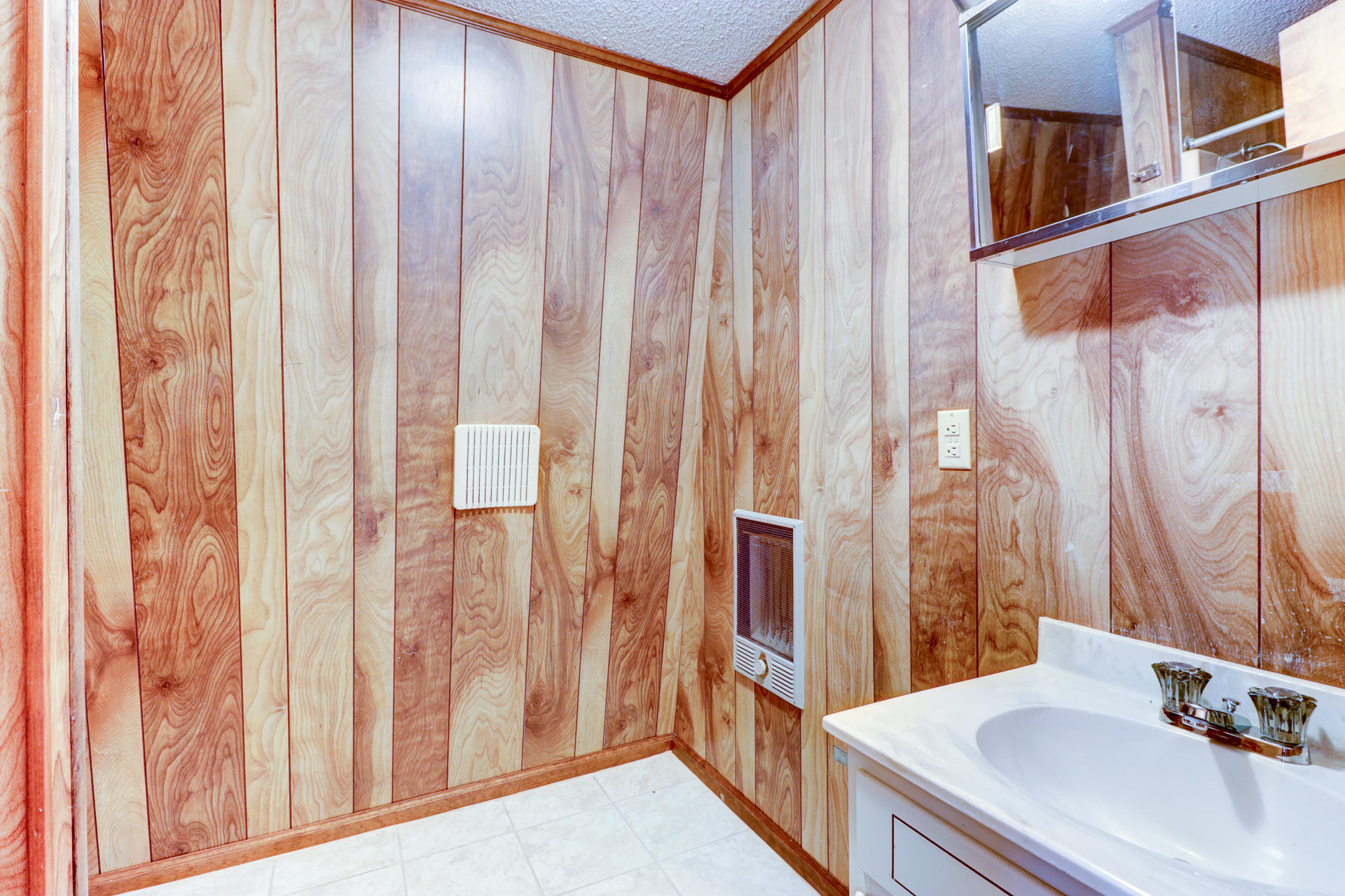 88 Ingram Road Henry, VA 24102 - Photo 23 of 34 a bathroom with a sink and a mirror