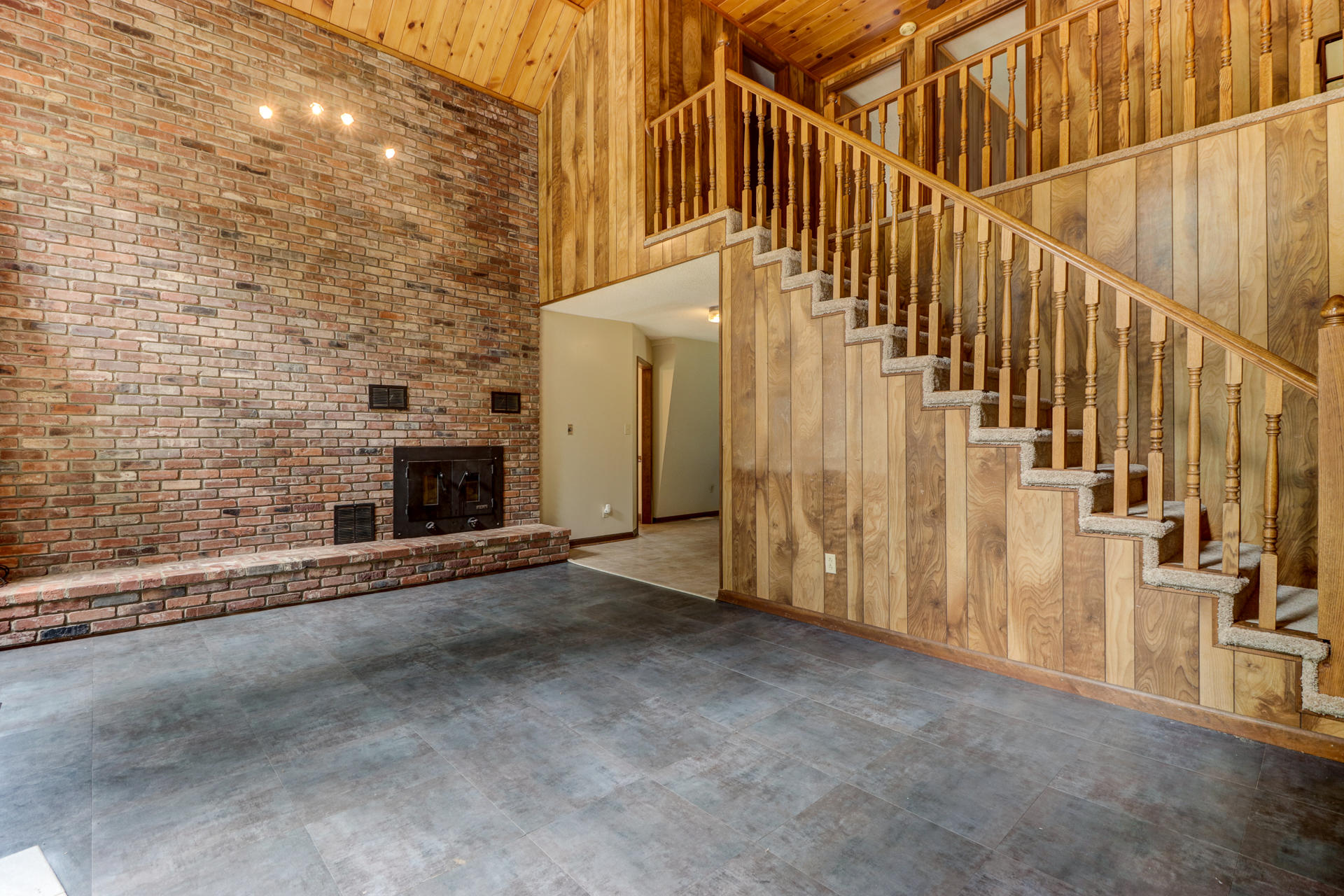 88 Ingram Road Henry, VA 24102 - Photo 4 of 34 a view of a livingroom with wooden floor and stairs