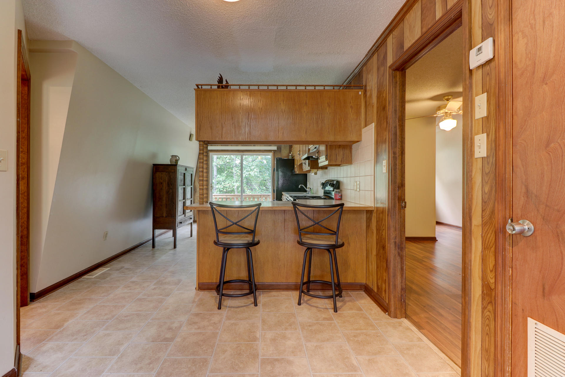 88 Ingram Road Henry, VA 24102 - Photo 6 of 34 a dining room with furniture and a window
