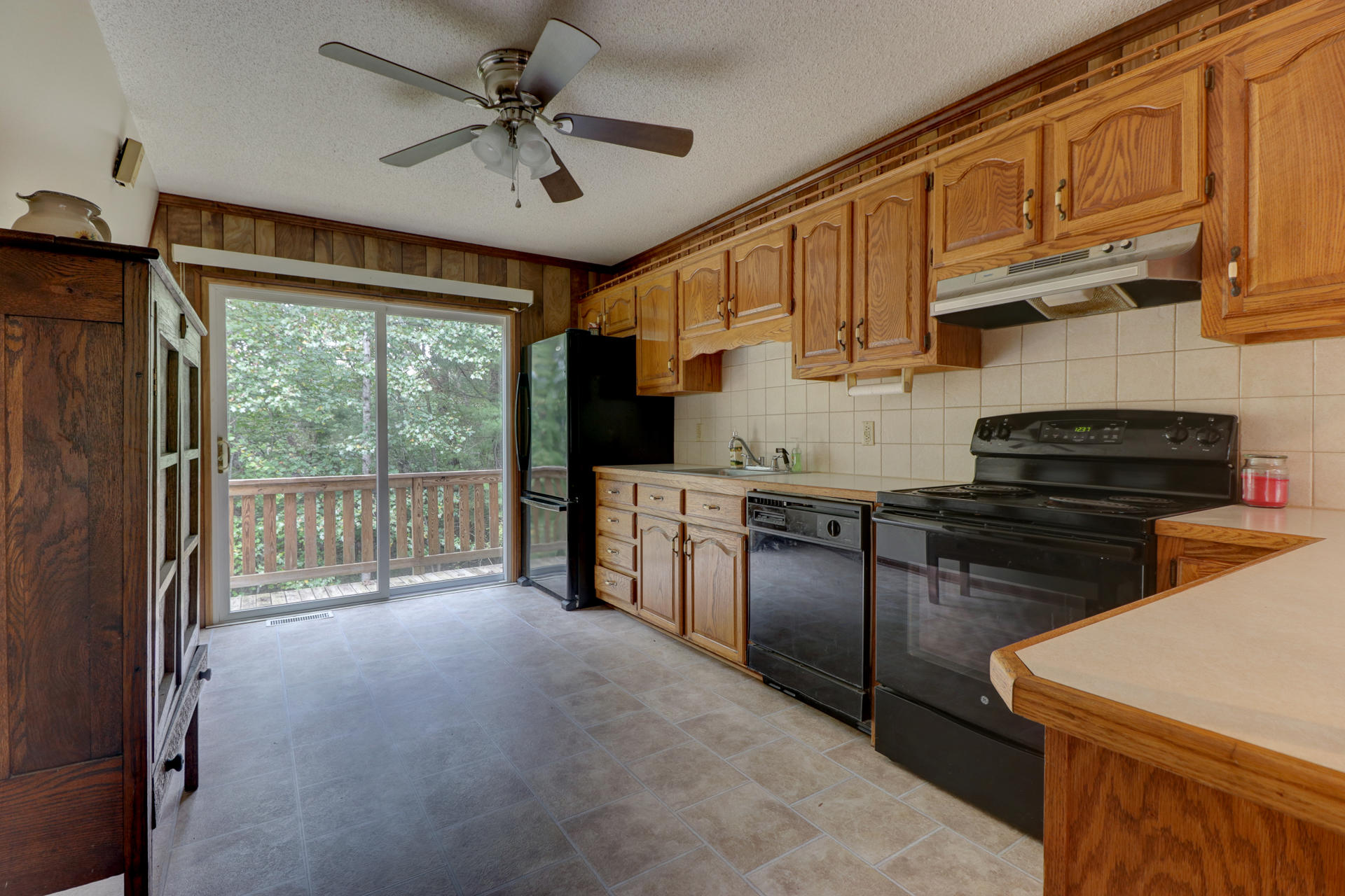 88 Ingram Road Henry, VA 24102 - Photo 9 of 34 a kitchen with stainless steel appliances granite countertop a stove sink and cabinets