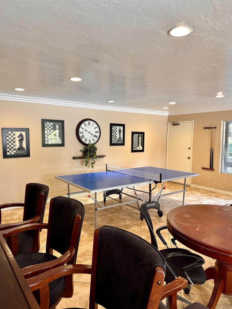 6394 Rancho Mission Road San Diego, CA 92108 - Photo 12 of 14 a view of a dining room with furniture