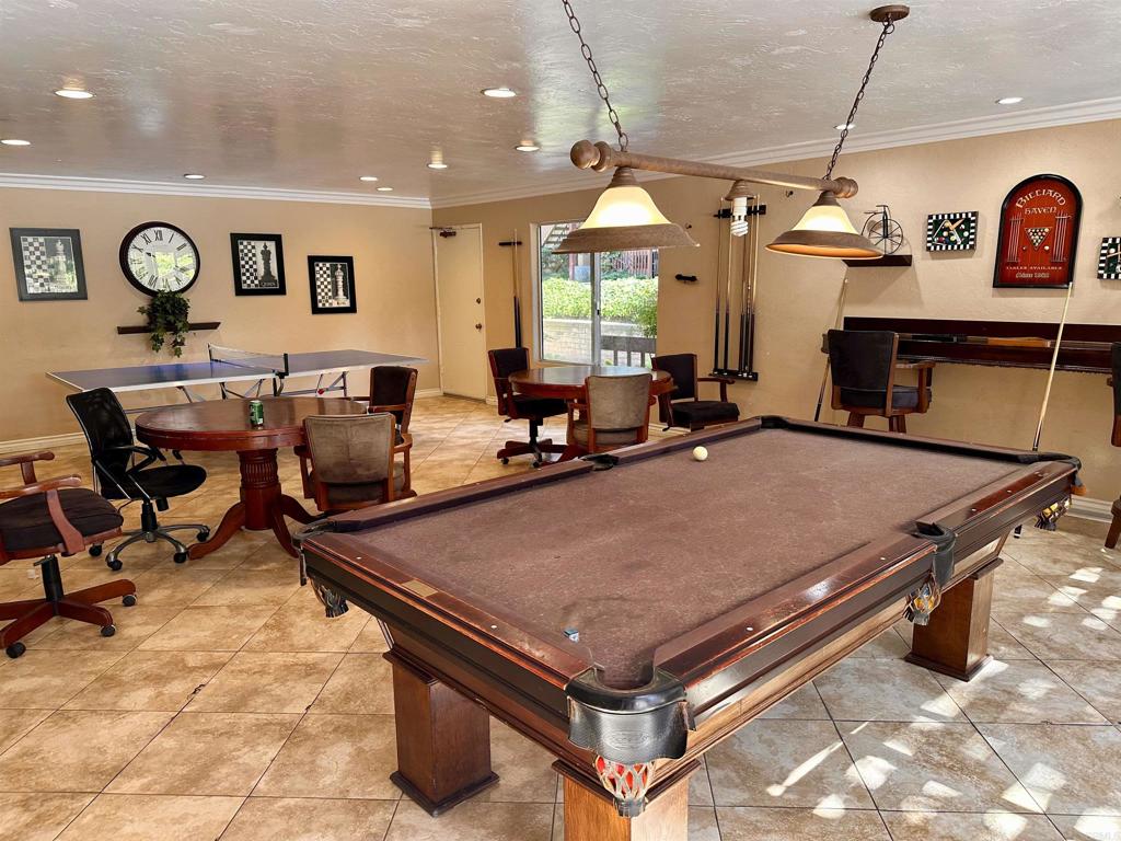 6394 Rancho Mission Road San Diego, CA 92108 - Photo 13 of 14 a room with pool table and window