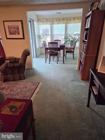 a view of a livingroom with furniture window and outside view