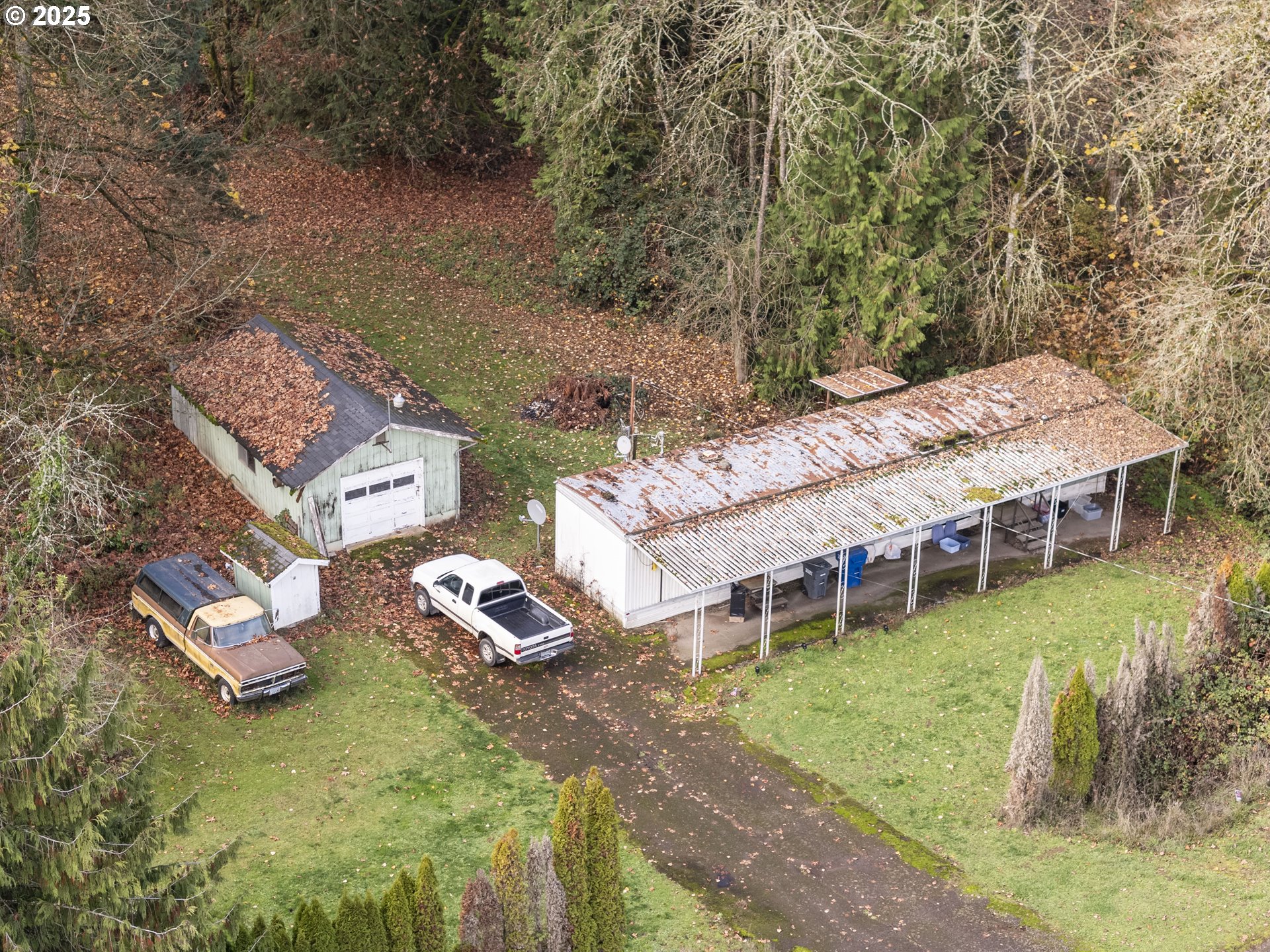 23921 Schultz Road Northeast Aurora, OR 97002 - Photo 17 of 25 an aerial view of a house with garden space and lake view