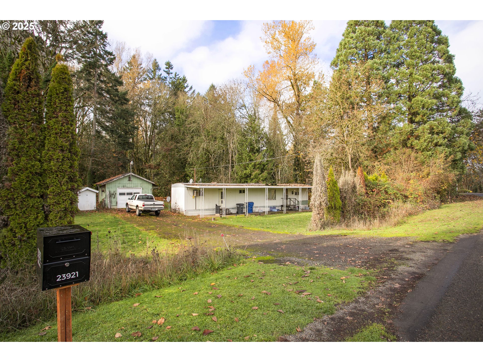 23921 Schultz Road Northeast Aurora, OR 97002 - Photo 20 of 25 a view of a house with a yard