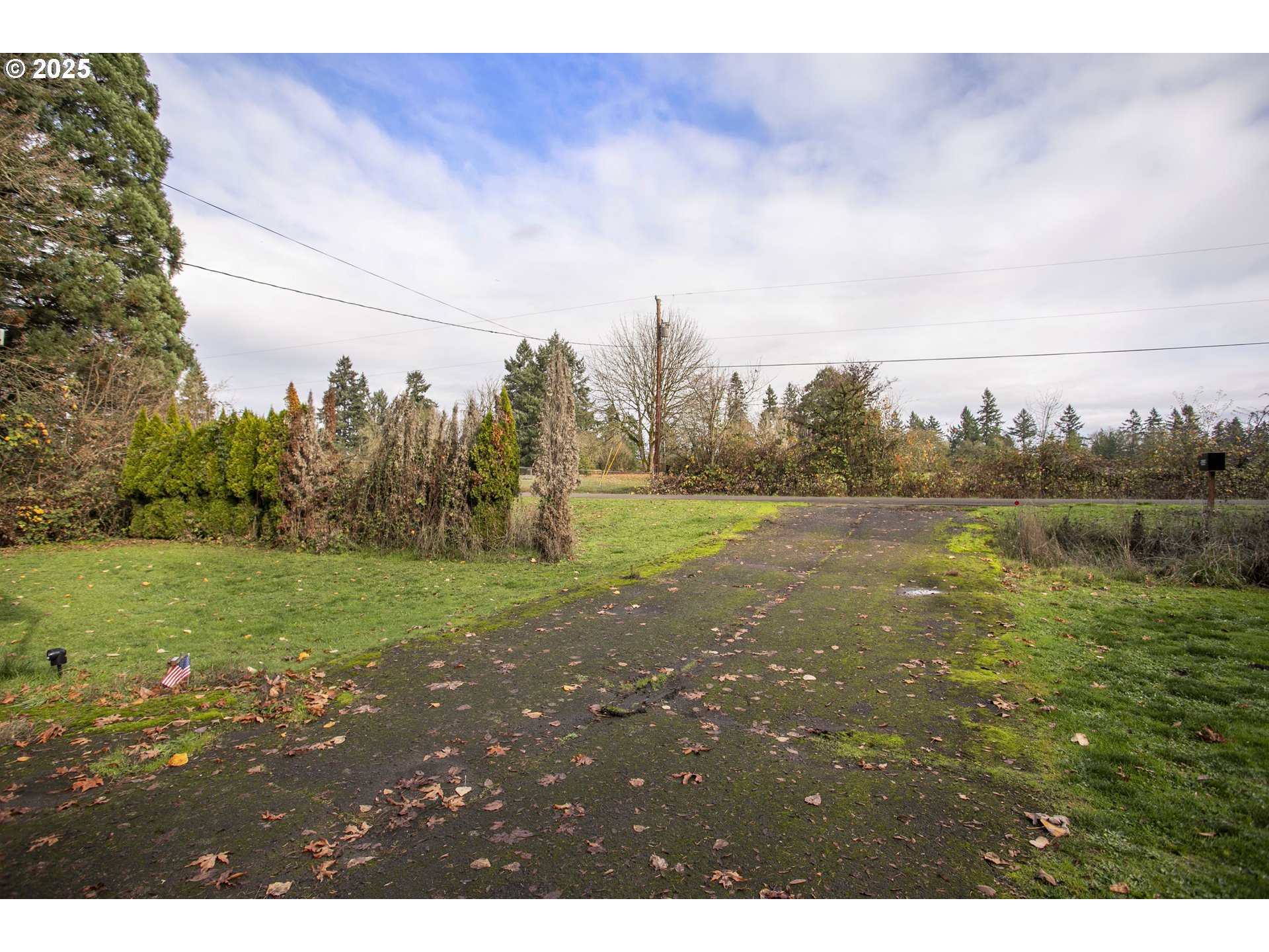 23921 Schultz Road Northeast Aurora, OR 97002 - Photo 22 of 25 a view of a field of grass and trees