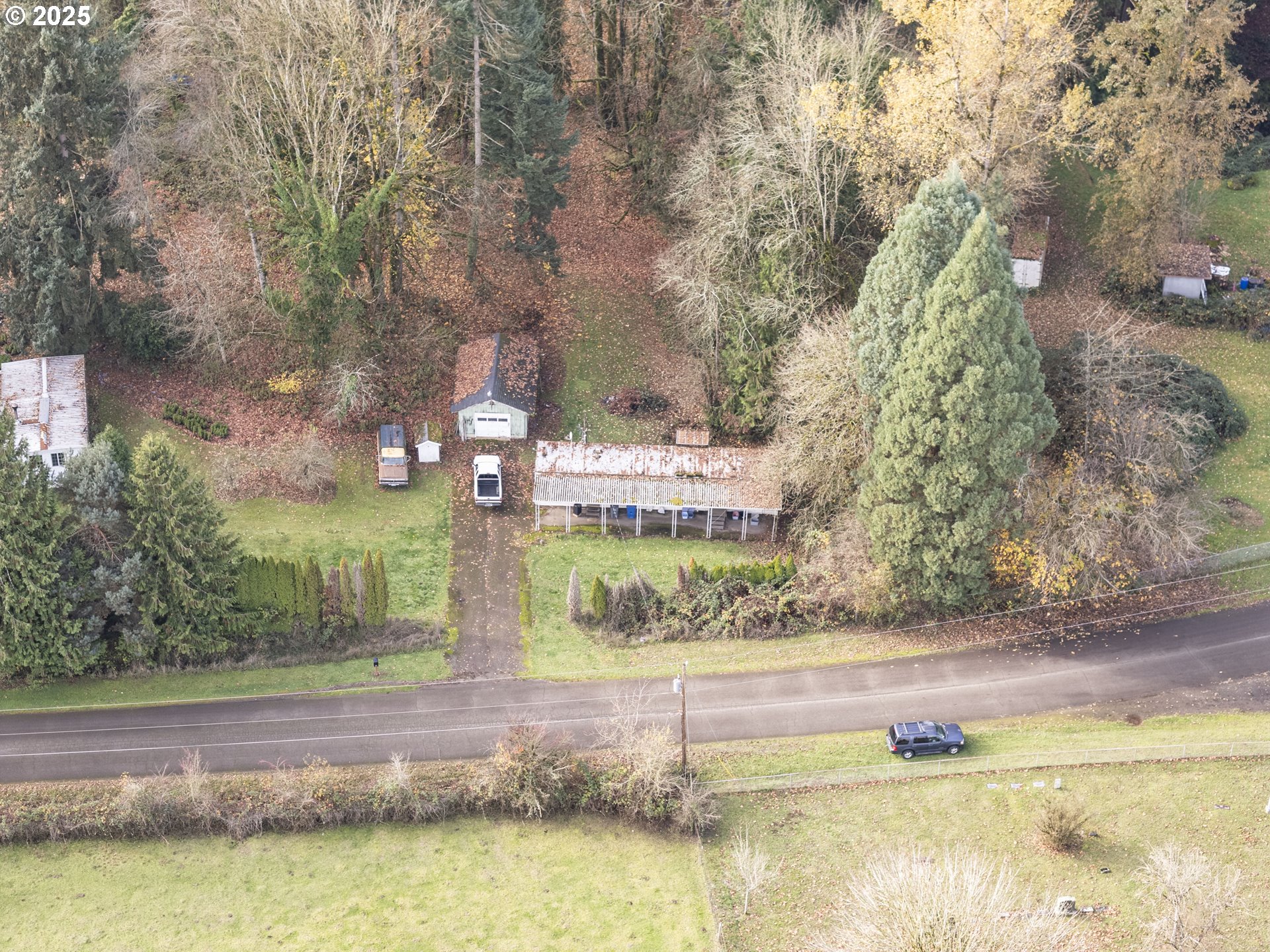 23921 Schultz Road Northeast Aurora, OR 97002 - Photo 6 of 25 a view of swimming pool with a yard and green space