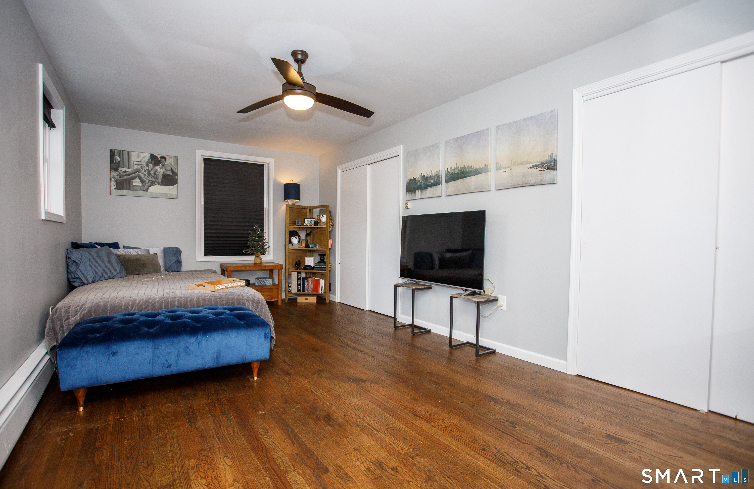 18 Richards Grove Road Waterford, CT 06375 - Photo 10 of 23 a spacious bedroom with a bed and a flat screen tv