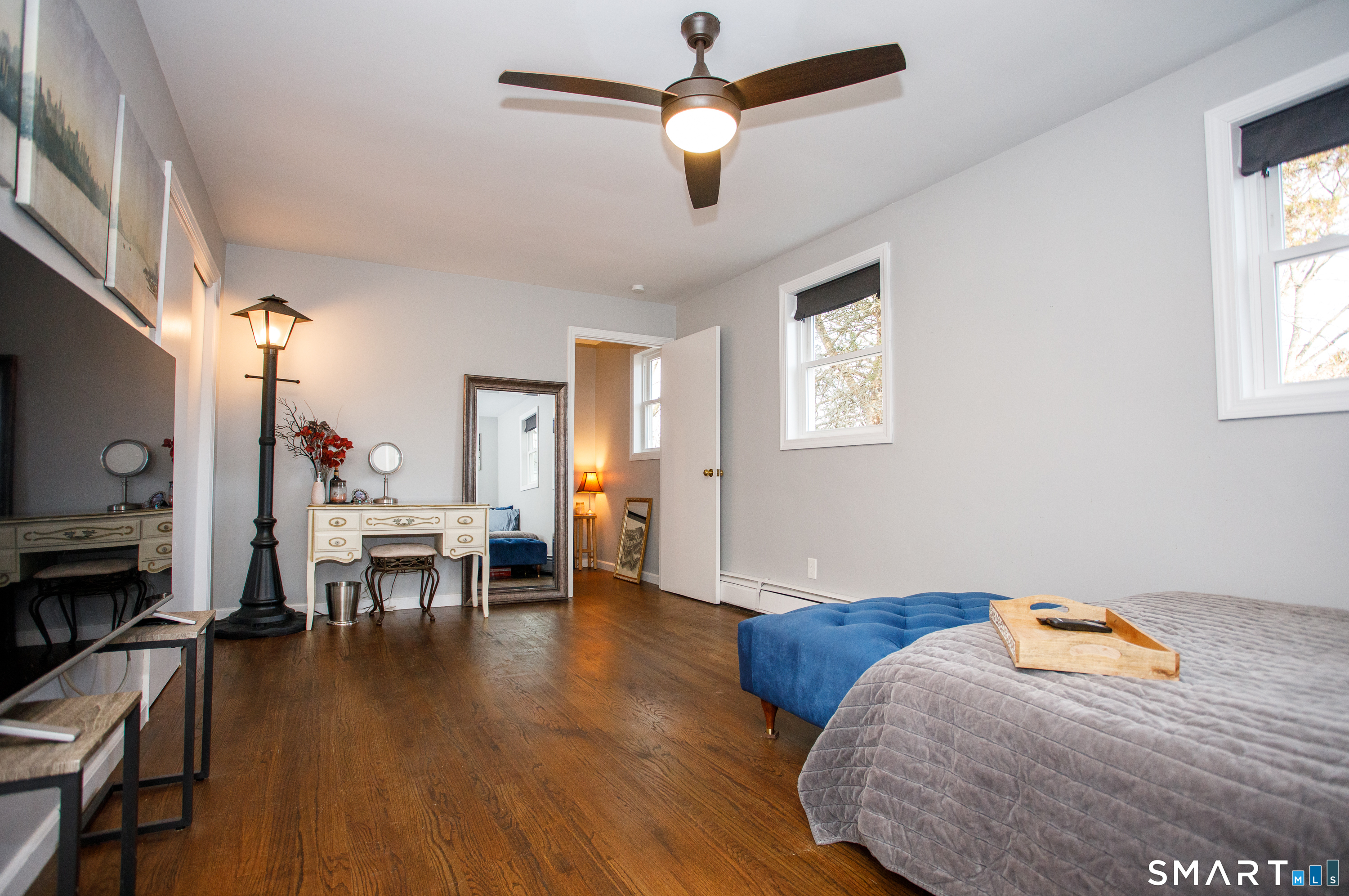 18 Richards Grove Road Waterford, CT 06375 - Photo 12 of 23 a bedroom with furniture and wooden floor