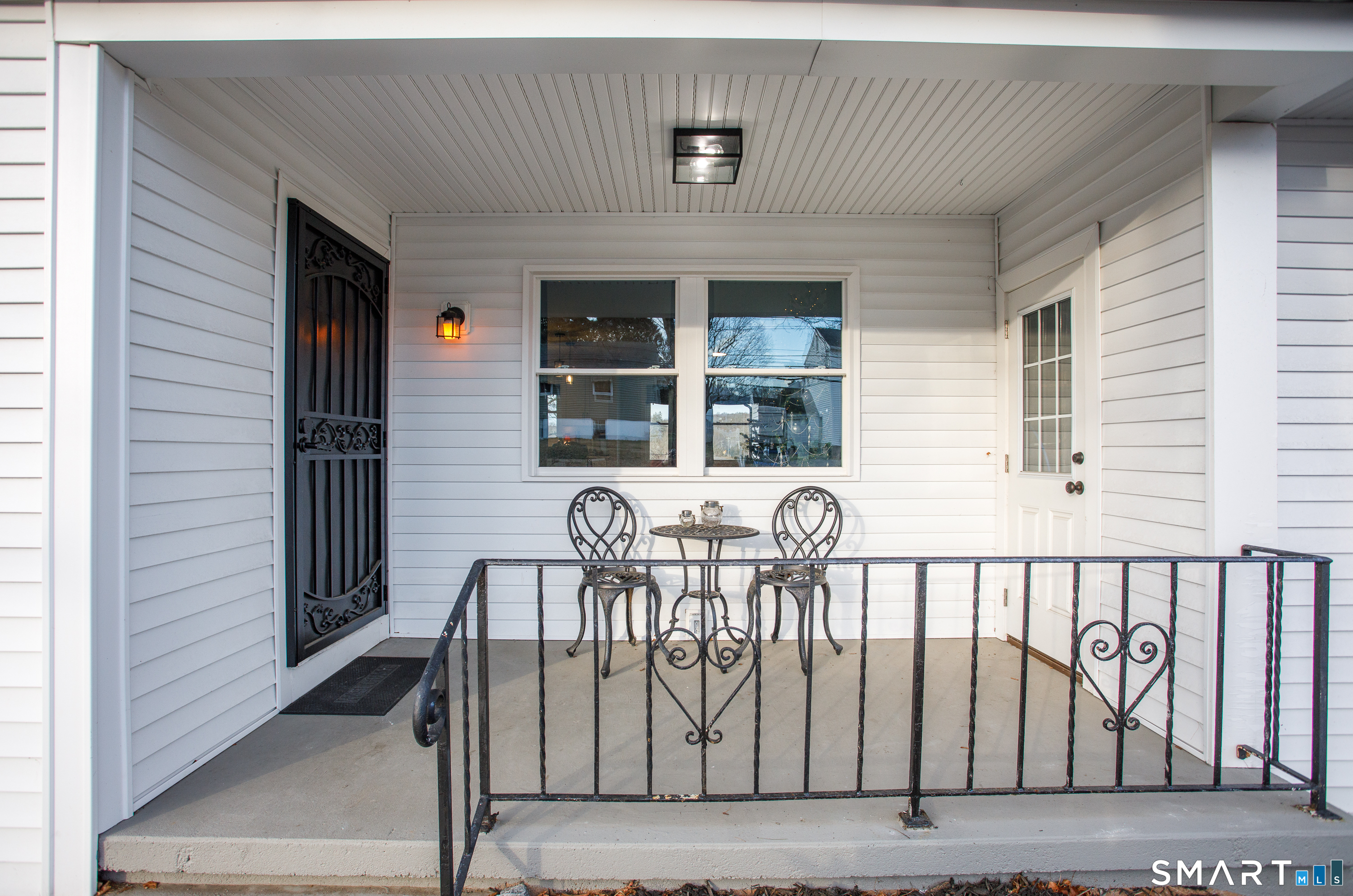 18 Richards Grove Road Waterford, CT 06375 - Photo 21 of 23 a front view of a house with glass door
