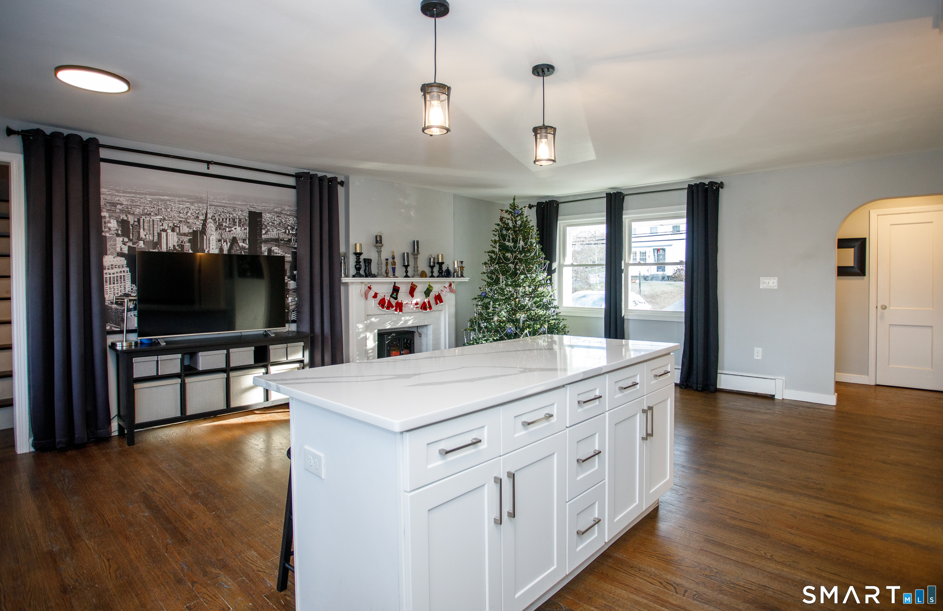 18 Richards Grove Road Waterford, CT 06375 - Photo 3 of 23 a view of living room with wooden floor and a flat screen tv