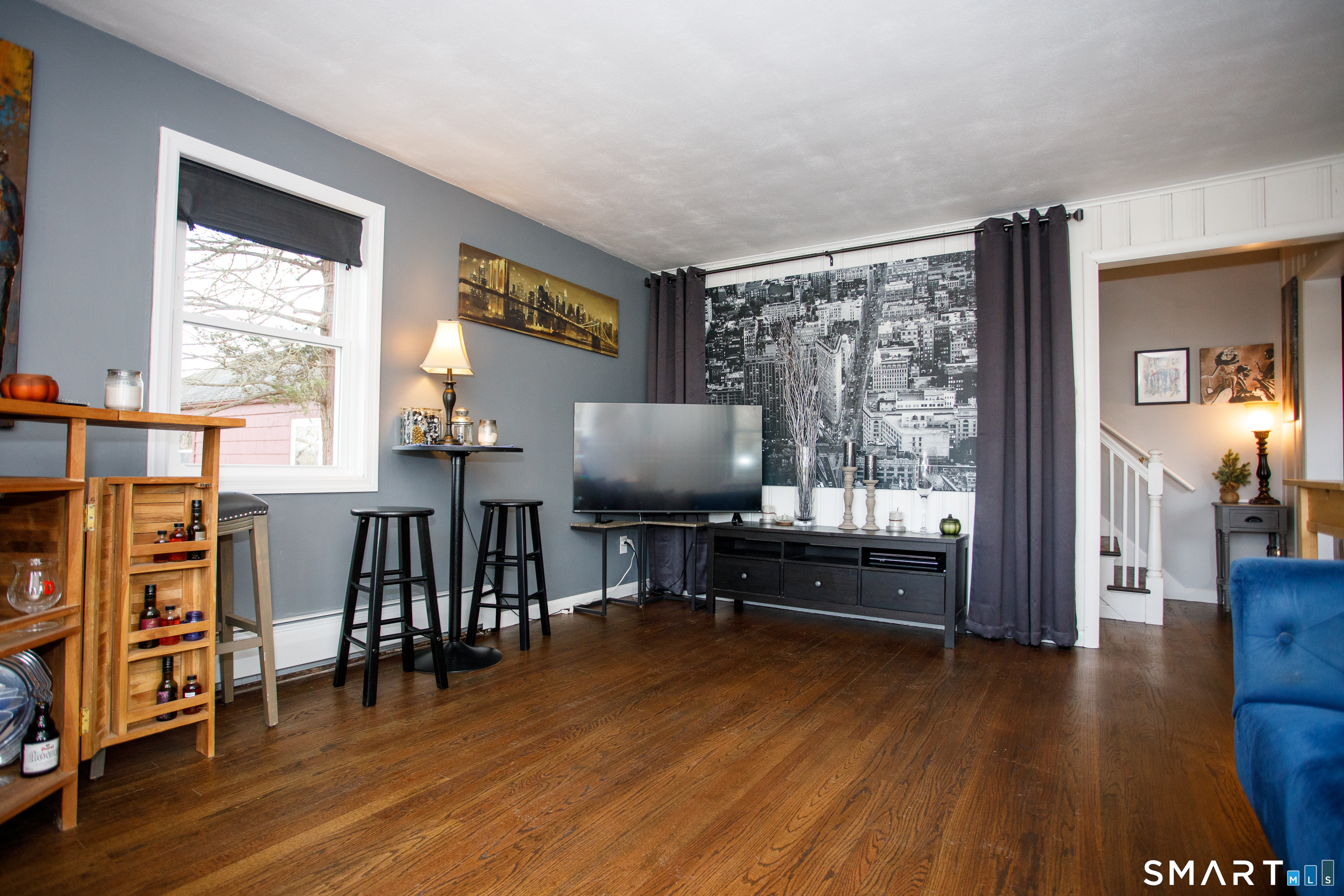 18 Richards Grove Road Waterford, CT 06375 - Photo 9 of 23 a living room with furniture and a flat screen tv
