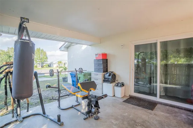an aerial view of a house with a lake view