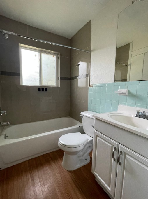 3106 Duval Street, Unit 203 Austin, TX 78705 - Photo 15 of 24 a bathroom with a sink toilet and shower