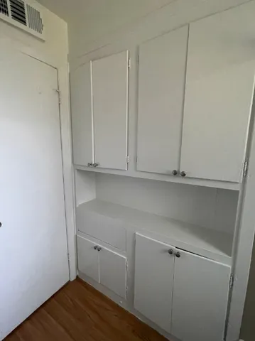 a view of an empty walk in closet