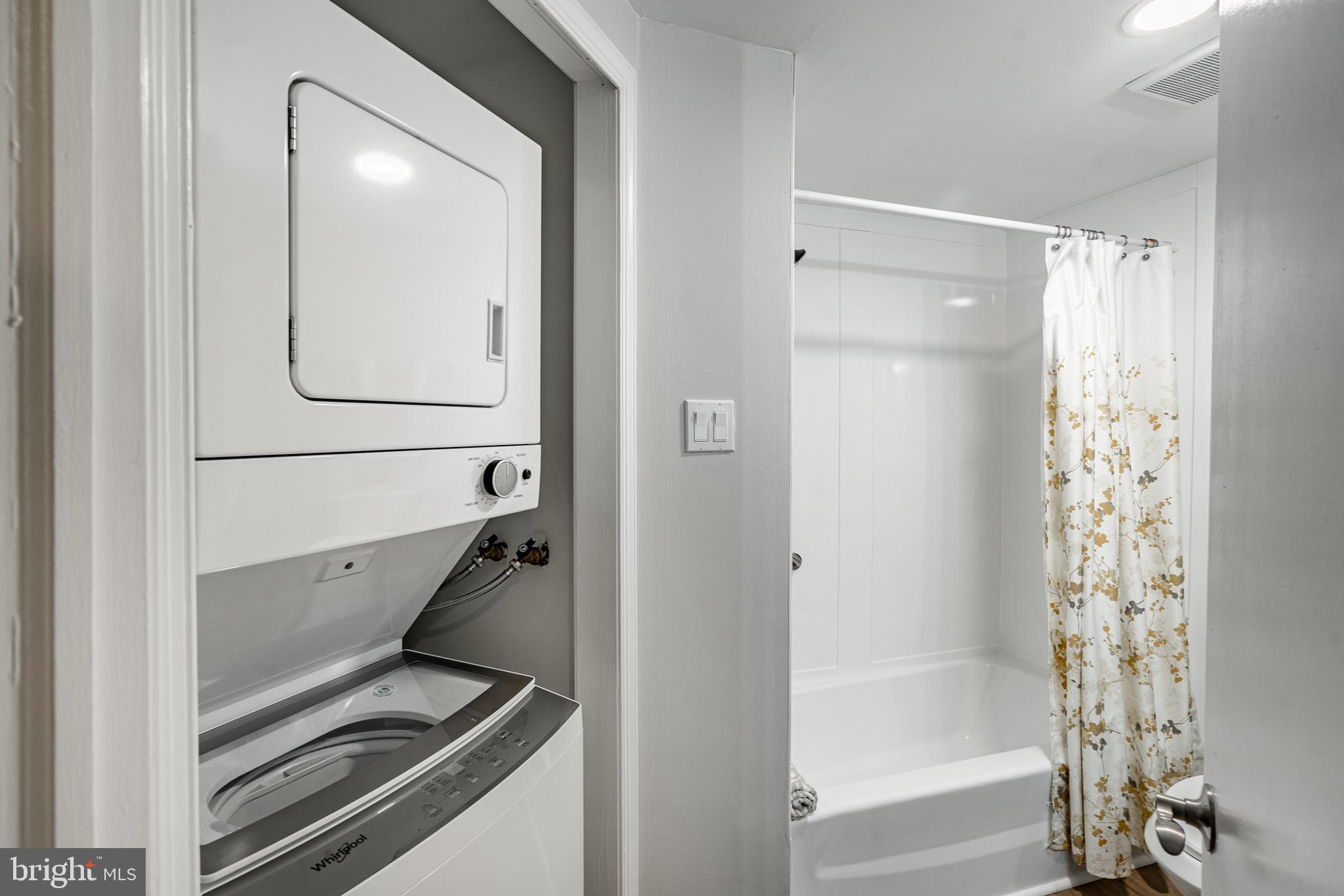 1219 West Wynnewood Road, Unit 105 Wynnewood, PA 19096 - Photo 20 of 34 a bathroom with a bathtub and shower