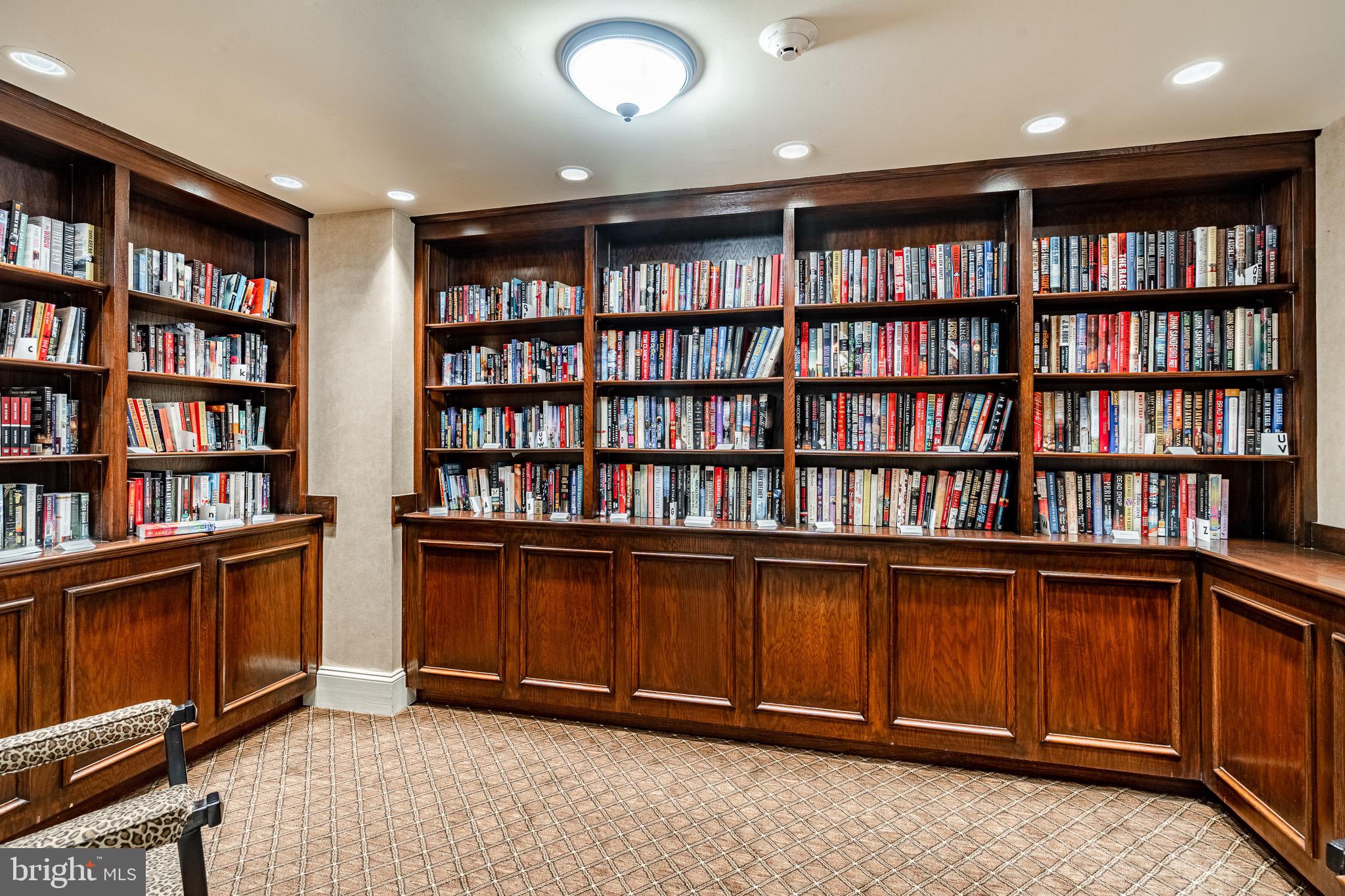 1219 West Wynnewood Road, Unit 105 Wynnewood, PA 19096 - Photo 32 of 34 a view of a book shelf with lots of books