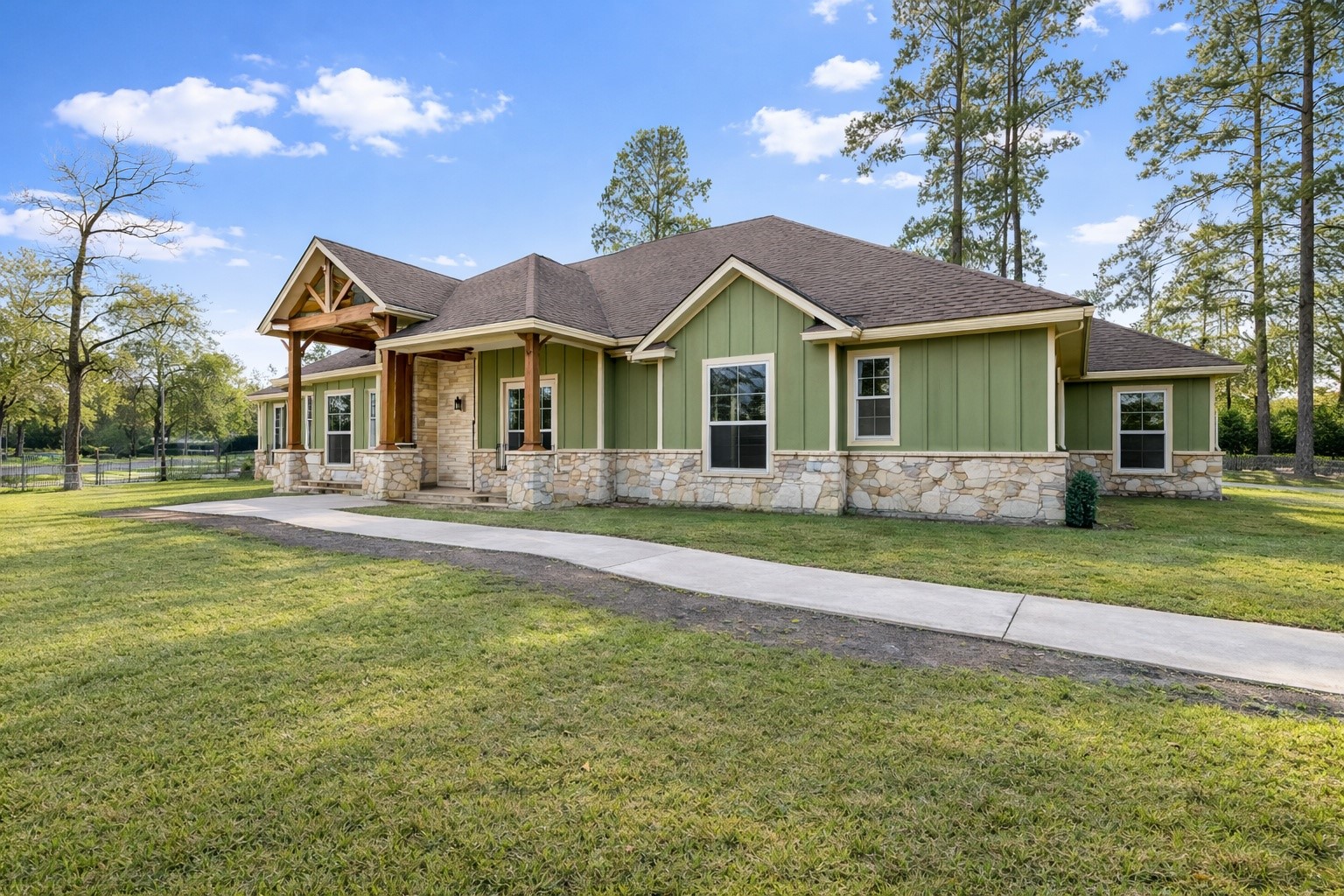 13327 Little Ranch Road Cypress, TX 77429 - Photo 2 of 49 a front view of a house with a yard