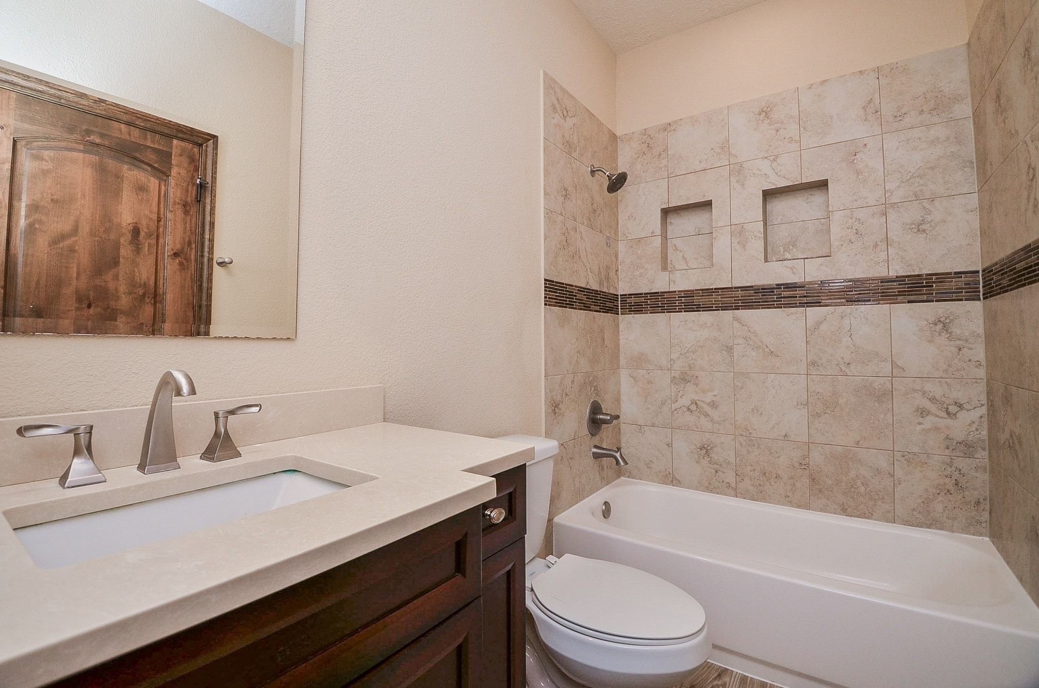 13327 Little Ranch Road Cypress, TX 77429 - Photo 30 of 49 a bathroom with a granite countertop sink toilet and shower