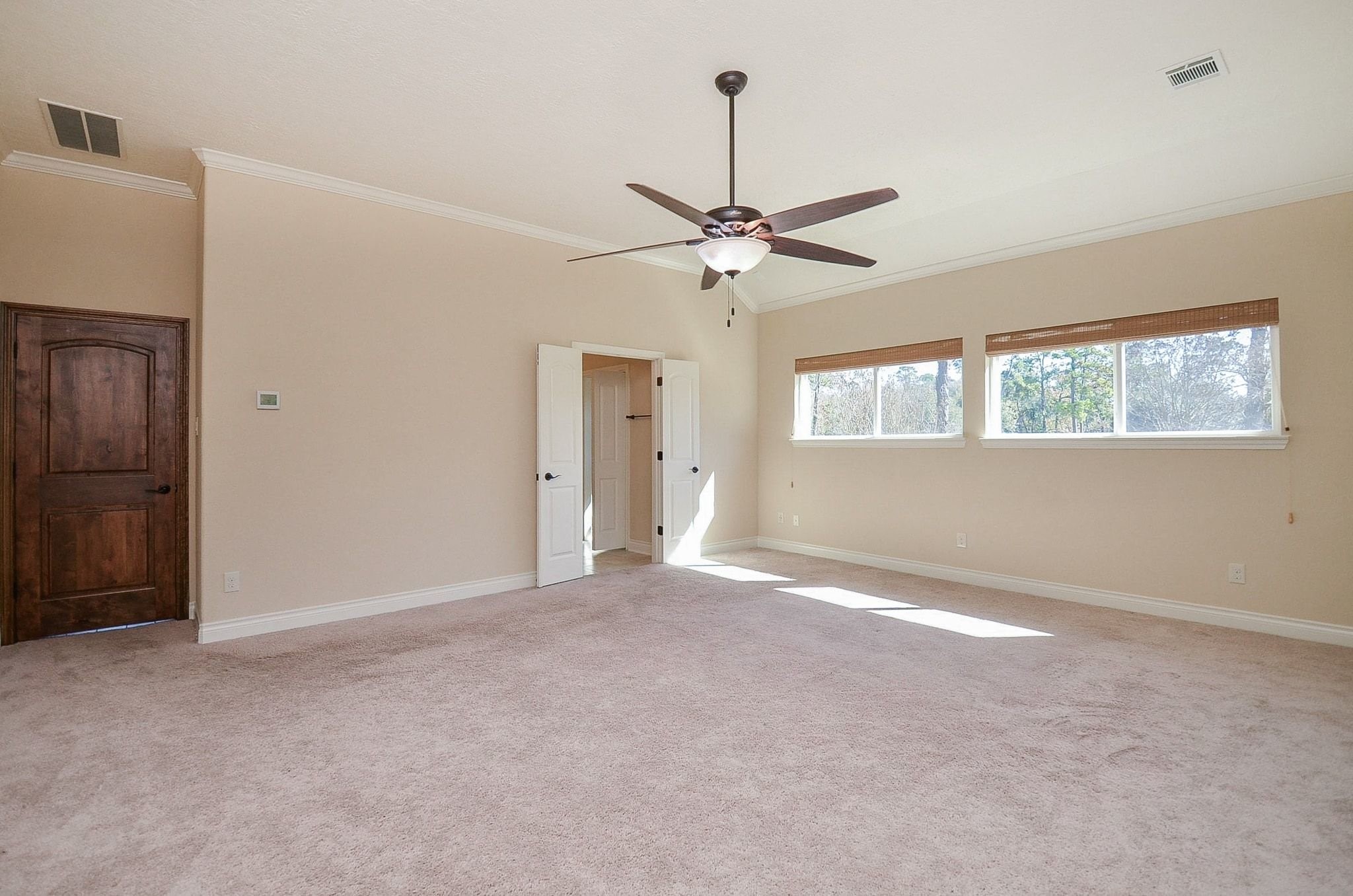 13327 Little Ranch Road Cypress, TX 77429 - Photo 33 of 49 a view of an empty room with a window
