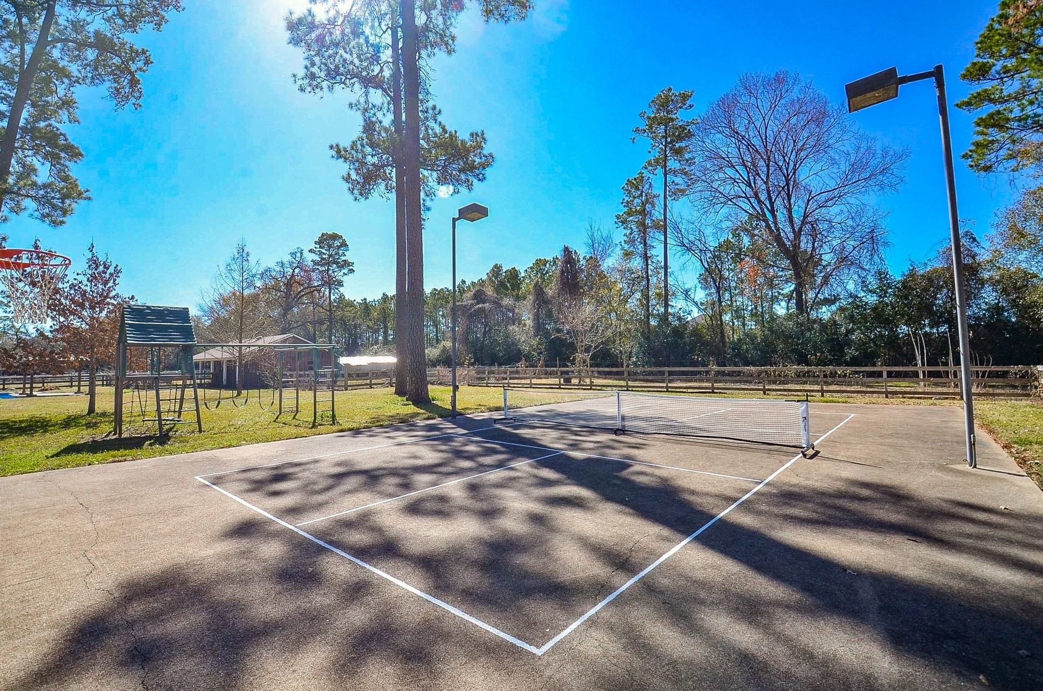 13327 Little Ranch Road Cypress, TX 77429 - Photo 4 of 49 a view of swimming pool with large trees