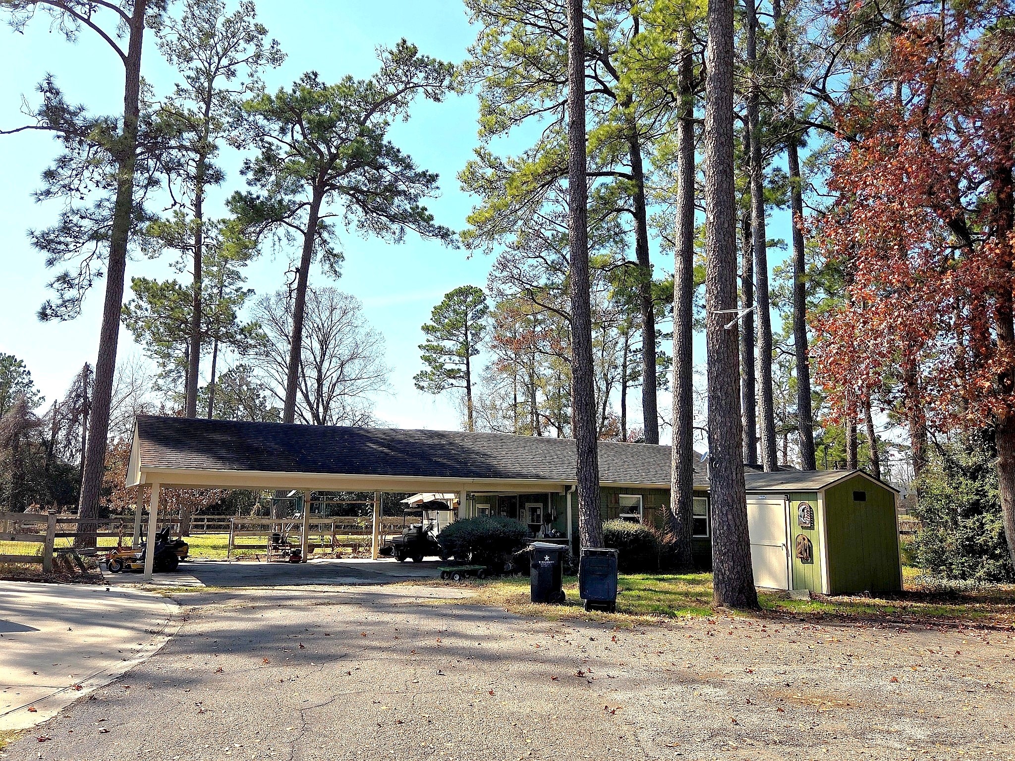 13327 Little Ranch Road Cypress, TX 77429 - Photo 42 of 49 The additional living space offers a flexible layout, perfect for use as an entertainment area, game room, media room, or private guest retreat. Outside, a covered patio provides added versatility and can serve as a carport or an inviting space for outdoor gatherings and entertaining.