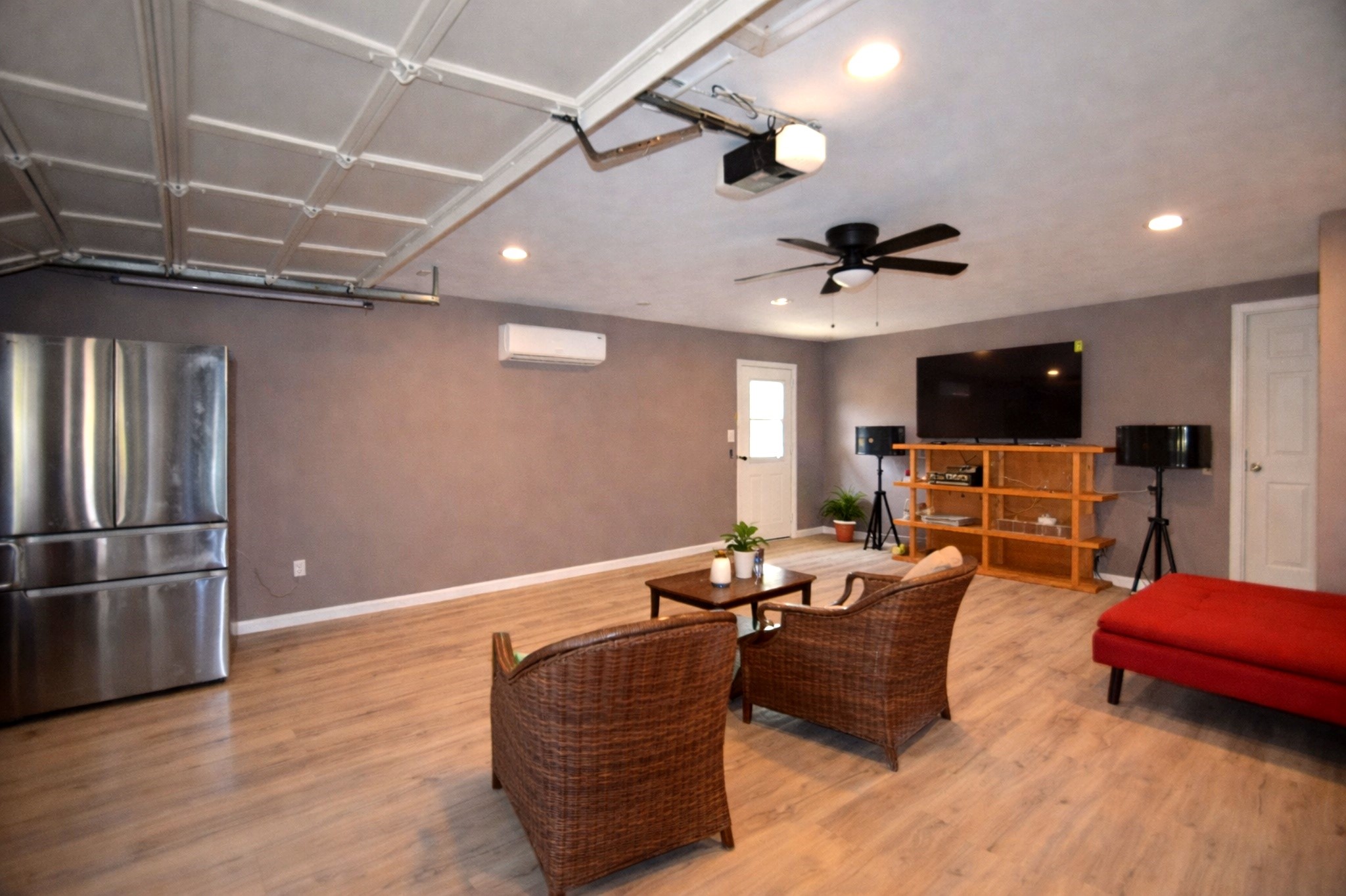 13327 Little Ranch Road Cypress, TX 77429 - Photo 43 of 49 a living room with furniture and a flat screen tv